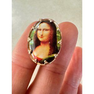 Hong Kong vintage MCM gold tone transfer printed Mona Lisa portrait brooch pin